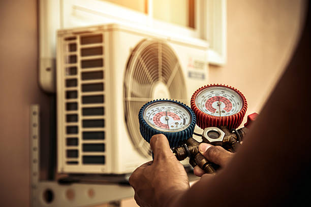 Professional Air Conditioning Service technician working in Geneva, AL